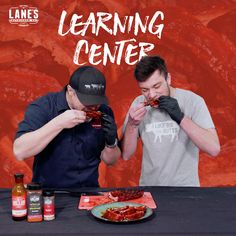 two men are eating food at a table