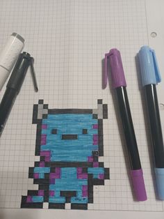 an image of a pixel art piece with markers and pens on it, next to a pen