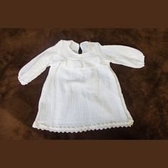 HANDMADE Cotton MUSILIN Blessing Dress. Light, soft and breathable. Size EU 62 - 68 (24,41 - 26,77 inch). Will fit to girl approx. 3 months. Perfect for baby photoshoots and Christening. This lovely Muslin dress gives your child complete freedom and movement and it will look amazing. Elegant and Comfortable pink dress.  Muslin is 100% cotton. It is a very lightweight and breathable fabric. We use only fabric with OEKO-TEX® certification. This means that every component of the end product has bee Spring Baptism Dress With Lace Trim And Long Sleeves, Spring Long Sleeve Baptism Dress With Lace Trim, Long Sleeve Baptism Dress With Lace Trim, White Long Sleeve Baptism Dress With Lace Trim, White Lace Long Sleeve Baptism Dress, White Long Sleeve Lace Baptism Dress, Long Sleeve Lace Baptism Dress, Cotton Baptism Dress With Lace Collar, Cotton Dress With Lace Collar For Baptism