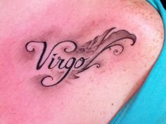 a woman's chest with the word virgo written in cursive writing