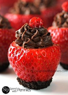 chocolate covered strawberries are sitting on top of each other