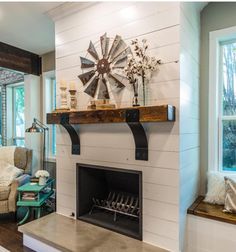 a living room filled with furniture and a fire place