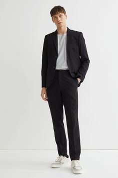 Suit pants in woven fabric with concealed zip fly and hook-and-eye fastener. Side pockets  welt back pockets  and legs with creases. Slim Fit – close-fitting at thighs  knees  and ankles for a tailored silhouette. Poses In Blazer Men, Men Work Outfits, Formal Suits Men, Suits And Sneakers, Slim Fit Suit Pants, Blazer Outfits Men, Mens Smart Casual Outfits, Black Suit Men, Mens Business Casual Outfits