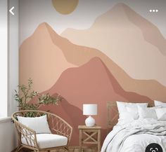 a bedroom with mountains painted on the wall