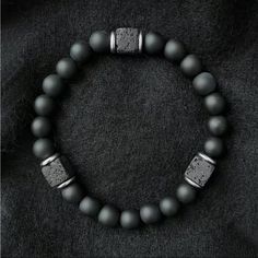 Matte Black Beaded Bracelet Is Made Of 8mm Natural Black Agate Stone And Lava Stone, A Balancing Stone That Can Help Release Stress. It's Very Sturdy And Not Easy To Break. Long-Term Wearing Can Keep People In A Good Mood. The Bracelet Is Around 7.5 Inches, And The Elastic Rope Will Fit Most Wrists. Comfortable To Wear, And Easy To Take Off And Put On. This Bracelet Is Brand New Boutique Item. One Bracelet Included. Tags- Gypsy, Boho, Chic, Wedding, Sunday, Weekend, Party, Fairy, Shower, Church, Mens Stretch Bracelets, Black Beaded Bracelet, Black Agate Stone, Wire Crochet Jewelry, Balance Bracelet, Black Beaded Bracelets, Weekend Party, Elastic Rope, Boho Chic Wedding