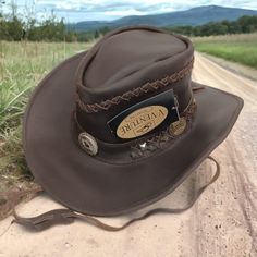 Keywords: Cowhide, Unisex, Leather, Handmade, Cowboy Hat. Short Description: This Stylish And Durable Cowboy Hat Is Crafted From Genuine Cowhide Leather, Making It A Versatile Choice For Both Men And Women. Handmade With Precision, It Combines Traditional Craftsmanship With Contemporary Fashion, Ensuring A Timeless And Rugged Appeal. Perfect For Adding A Touch Of Western Charm To Any Outfit. Cowboy Hat Styles, Leather Cowboy Hats, Cowboy Design, Handmade Hats, Leather Making, Western Hat, Western Hats, Western Leather, Leather Hats