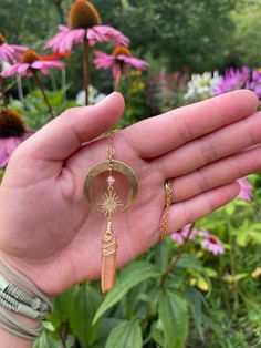 "Celestial Amber Quartz Goddess Necklaces 🌟🌙 Connect with your inner astrology today by wearing these moon & sun or star goddess inspired necklaces🌙✨ The amber colored quartz crystals are attached to coated golden brass crescent moons & wrapped with gold wire. Choose between 16\" long necklace chain or 18\" long necklace chain! 😉 **No two amber colored quartz are exactly alike, but they will be chosen at random & close to the pictured photo! 😍✨ Made with L❤️VE by MollyFlower :) Mystical Gold Necklace With Sun And Moon Design, Gold Mystical Necklace With Sun And Moon Design, Celestial Moon Phase Crystal Necklaces, Gold Moon-shaped Wire Wrapped Jewelry, Gold Crescent Wire Wrapped Necklaces, Celestial Gold Jewelry For Festivals, Gold Moon-shaped Bohemian Jewelry, Bohemian Moon-shaped Gold Jewelry, Magical Gold Jewelry For Festival