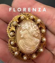 Signed FLORENZA Vintage retro ornate gold tone seed Pearl & carved shell CAMEO brooch with roll clasp Vintage Gold Intaglio Brooches, Elegant Carved Gold Brooches, Ornate Carved Collectible Brooches, Vintage Baroque Brooch Jewelry, Antique Gold Intaglio Brooches, Ornate Carved Gold Brooches, Ornate Gold Carved Brooches, Vintage Yellow Gold Baroque Brooch, Collectible Gold Filigree Brooches