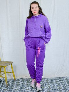 "AUNT GERTRUDE PRESENTS - vintage 90's purple tracksuit - brand: Skis Dynastar - lined, insulated - material: 100% cotton CONDITION (1-10 ❶❷❸❹❺❻❼❽ Good vintage condition SIZE/MEASUREMENTS size from label: XL TOP chest: 52 inches (132 cm) length: 23,5 inches (60 cm) sleeve length from armpit: 18 inches (46 cm) PANTS waist: 33-40 inches (84-102 cm) elastic waist hips: 44 inches (112 cm) rise: 12 inches (31 cm) length: 40 inches (101 cm) inseam: 30 inches (76 cm) The model is 5'9\" (174 cm), measur Purple Relaxed Fit Sweatpants For Athleisure, Purple Relaxed Fit Sporty Sweatpants, Sporty Winter Workout Joggers, Purple Athleisure Joggers For Loungewear, Casual Purple Activewear For Loungewear, 90s Style Cotton Sweatpants For Streetwear, Sporty Winter Tracksuit For Jogging, Sporty Purple Sweatpants For Sports, Winter Tracksuit Relaxed Fit For Gym