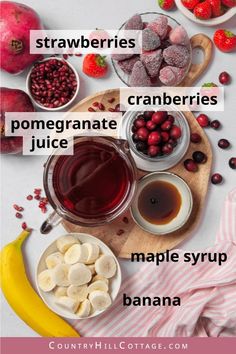 ingredients to make cranberry juice on a cutting board with bananas and strawberries