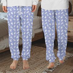 Our Adult Pajama Pants are designed for ultimate comfort and style.  Made from a premium 4-way stretch fabric blend of 95% polyester and 5% spandex, these pants offer flexibility and ease of movement, making them perfect for lounging or sleeping.  The elastic waistband and cuffs ensure a snug fit without compromising on comfort.  With a relaxed, unisex style, these pajama pants are a cozy essential for anyone looking to unwind in style. Spring Loungewear Pants With 4-way Stretch, 4-way Stretch Tapered Leg Bottoms For Loungewear, Loungewear Pants With Comfort Waistband And 4-way Stretch, Loungewear Pants With 4-way Stretch And Comfort Waistband, Tapered Leg Sweatpants With 4-way Stretch For Loungewear, 4-way Stretch Ankle-length Lounge Pants, White Cotton 4-way Stretch Bottoms, Adult Pajamas, Rabbit Gifts