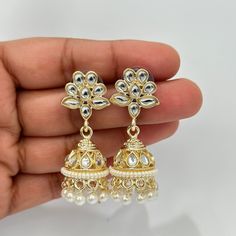 Small Light weight kundan Jhumka/kundan Jhumka/Indian Jewelry/Pakistani/Punjabi/Indian/Statement earring/Bridal earring/Indian wedding Lightweight and elegant Height = 48 mm || Width = 17 mm Pearl Jhumki Indo Western Earring Can be paired with any dress Closure: Pushback This is 100% Handmade jewelry. So Color, shades, texture displayed may slightly vary from the actual product due to digital image limitations. We request you to consider these minor variations. Please expect the possibility of s Western Earring, Kundan Jhumka, Earring Indian, Earring Bridal, Bridal Earring, Jewelry Pakistani, Western Earrings, San Ramon, Statement Earring