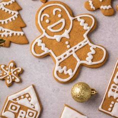 gingerbread cutouts and decorations on a table