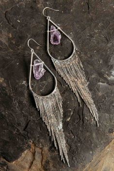 Our most popular crystal fringe statement earrings now come with Amethyst crystals. These unique tassel earrings look stunning when the light dances off of them! They are the perfect bridal or bridesmaids earrings or would make a great gift for yourself or a girlfriend. Amethyst is a stone of intuition, connecting you to your inner wisdom, empowering you to trust yourself! Amethyst crystals *color of purple amethyst is lighter purple and ranges in lightness Silver fringe earrings Weight: .22 oz Crystal Fringe, Chakra Gifts, Bridesmaids Earrings, Amethyst Crystals, Inner Wisdom, Crystal Suncatchers, Crystal Accessories, Mala Necklace, Drop Dangle Earrings