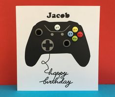 a happy birthday card with a video game controller