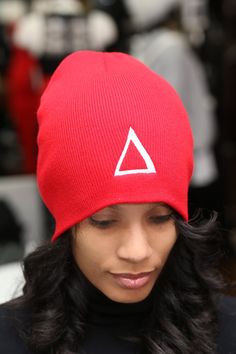 Burning Sands is the only place you'll see this beanie. So chances are you'll be the only soror in your area rocking it. Now, don't be mean... when sorors ask you where you got it, tell them. :-) We only use the softest, most plush fabrics that will keep you warm and last for years. Short style ribbed beanie. 100% stitched embroidered design. Dry Clean Only. Perfect for those Devastating Divas who need to keep their head super warm in the days of cold weather. Especially for those snowy ski trip Red Casual Beanie For Streetwear, Red Beanie For Streetwear, Ski Trip, Embroidered Design, Got It, Cold Weather, Diva, Hats, Red