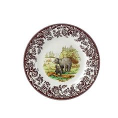 a brown and white plate with an elephant on it