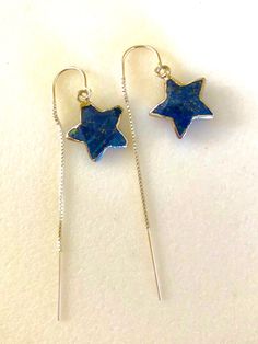 "Darling petite lapis lazuli stars on short \"U\" style sterling silver box chain threaders. Deep blue lapis lazuli 13 x 15 x 5mm two-sided silver electroplated stars suspended from short front .925 sterling silver threaders with \"U\" style to prevent loosing an earring. Front drop with star is 7/8\". Back drop is 2\". Delicate and sparkly star dangles!" Celestial Star-shaped Sterling Silver Jewelry, Sterling Silver Earrings With Star Charm, Adjustable Star-shaped Sterling Silver Earrings, Adjustable Sterling Silver Star Earrings, Star Shaped Stamped 925 Silver Jewelry Gift, Star-shaped Stamped 925 Silver Jewelry Gift, Blue Sterling Silver Star Earrings, Blue Star-shaped Sterling Silver Earrings, Paris Charm Bracelet