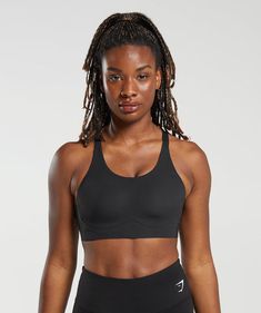 IT’S NOT YOU, IT’S YOUR SPORTS BRA With lightweight, breathable designs, comfortable cups and supportive straps, you can rely on our sports bras to be there for you, and for yours. • Bonded seams for zero distraction• Moulded cups for comfort• Cross back design SIZE & FIT• High support• 4 extender hook and eye fastening for an adjustable fit• Model 1 is 5'9" and wears size XS• Model 2 is 5'10" and wears size L MATERIALS & CARE• 78% Nylon, 22% Elastane SKU: B5A5J-BBBB Active Outfits, Black Cross, Sport Bh, Sport Bra, Black Sports Bra, Back Design, Comfy Casual, Sports Bras, Workout Wear