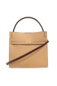 We are delighted to present the 'LEE RADZIWILL' SHOULDER BAG by the esteemed designer TORY BURCH, embodying the pinnacle of luxury and elegance. Crafted from the finest leather in a subtle beige-cream palette, this bag is a perfect complement to both day and evening ensembles. Its distinctive rectangular shape with gently rounded corners, combined with a smooth finish, gives this piece a timeless appeal. The gold clasp at the front not only secures your belongings but also adds an elegant decorative touch. A long, adjustable shoulder strap and a short handle at the top offer versatility in carrying, highlighting the bag’s functionality. The interior of the bag, lined with high-quality material, features a spacious main compartment and three pockets – two with zippers and one slip pocket, e Lee Radziwill, Tory Burch Crossbody, Heeled Rain Boots, High Heel Rain Boots, Tory Burch Tote, Tory Burch Bag Totes, Backpack Tote Bag, Tory Burch Bags, Tory Burch Bag