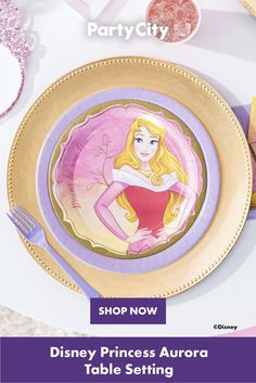 the disney princess aurora table setting is shown