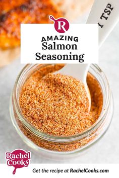 the recipe for amazing seasoning is in a jar and it has a spoon inside