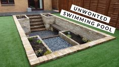 an outdoor swimming pool surrounded by artificial grass and brick walls with the words unwoned swimming pool above it