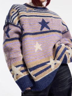 Embrace a nostalgic charm with the Vintage Stars Striped Knitted Sweater. This unisex piece boasts a cozy knit fabric, enhanced by a drop shoulder design and classic crew neck. Its long sleeves and soft touch make it a perfect addition to any winter wardrobe, offering a blend of comfort, retro allure, and streetwise style. Y2K vintage aesthetic Unisex Soft touch knit material Drop shoulder Crew neck Long sleeve Order 1 size larger to be oversized Cozy Long Sleeve Sweater With Star Print, Winter Star Print Crew Neck Sweatshirt, Winter Crew Neck Sweatshirt With Star Print, Trendy Crew Neck Sweater With Fair Isle Pattern, Trendy Crew Neck Fair Isle Sweater, Trendy Fair Isle Pattern Crew Neck Sweater, Casual Crew Neck Sweater With Star Print, Retro Relaxed Fit Sweater For Winter, Retro Relaxed Fit Winter Sweater