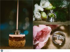 wedding rings and engagement ring sitting on top of a table