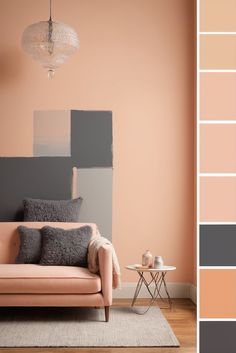 a living room with pink and grey walls