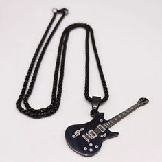 Stainless Steel Pendant. Stainless Steel Chain. Lobster Clasp Closure. Black Metal Rock Style Jewelry, Black Rock Style Jewelry For Concerts, Black Metal Rocker Jewelry, Black Metal Rocker Style Jewelry, Black Rocker Style Metal Jewelry, Casual Black Chain Necklace, Black Chain Jewelry For Concerts, Black Chain Necklace For Concert, Edgy Black Stainless Steel Necklace