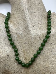 "vintage Jade beaded 22 inch necklace Gorgeous and delicate hand knotted beads All jewelry is shipped free in the US in a nice gift box.   Check out our over a THOUSAND great reviews This is \"fun jade\" Color enhanced stone. Vintage 1970's re finished." Jade Beaded Necklace With Gemstone Beads, Jade Beaded Necklaces With Gemstone Beads, Beaded Jade Necklaces With Gemstone Beads, Spiritual Round Jade Beaded Necklaces, Spiritual Jade Beaded Necklace, Spiritual Round Jade Beaded Necklace, Jade Beaded Single Strand Necklace Gift, Jade Beaded Necklace With Polished Beads, Jade Single Strand Beaded Necklace Gift