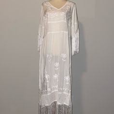 This Is A Beautiful Brand New Dress, Never Worn. It Can Be Worn As A Beach Cover Up Or Wear A Slip Underneath And Go Out On The Town! No Defects Nwot (Because It Didn’t Come With Tags, It’s Sold In A Protective Bag) Size Small 18 Inches Across Laying Flat White Fringe Dress, White Fringe, Fringe Dress, Beach Covers, Go Out, New Dress, Colorful Dresses, Going Out, Cover Up