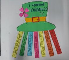 a st patrick's day craft made out of colored strips and a green hat