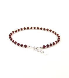 DESCRIPTION: Minimalist Red Garnet Faceted Anklet for Adults; Bead Shape: Round (Faceted); Weight: ~3 g; Type of Clasp: Lobster (adjustable by ~2 cm); Gems: Red Garnet Bead Size: Garnet - ~4 mm, Silver ~2 mm; SHIPPING INFORMATION We send all orders within 1-3 business days after the payment is cleared. All packages are being sent via Regular Air Post (Registered). The most common Delivery time is as follows: Europe: 10-30 days; USA: 15-45 days; Elsewhere: 15-45 days; PACKAGING For convenient gifting, each anklet / bracelet from our shop comes packed together with a pouch. Red Garnet Gemstone Beads Jewelry, Garnet Jewelry With Faceted Beads For Gift, Adjustable Garnet Gemstone Bracelet, Red Garnet Jewelry With Faceted Beads, Faceted Garnet Red Necklace, Devil Costume, Anklet Bracelet, Anklet Jewelry, Red Garnet