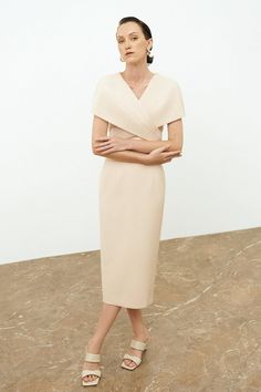 Structured Beige Formal Dress, Beige Structured Formal Dress, Elegant Beige Midi Dress With Surplice Neckline, Elegant Workwear Dresses With Cape Sleeves, Modern Beige Dress For Formal Occasions, Formal Midi Dress With Draped Sleeves And Surplice Neckline, Modern Beige Formal Dress, Cocktail Wrap Dress With Draped Sleeves, Chic Wrap Dress For Office