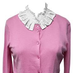 Look elegant and classy with our floral lace half shirt faux collar. The collar features a lace ruffle with lovely looking floral lace. The collar is also detachable; you can wear it under your sweaters, blouses, casual shirts, and dresses for a more vintage and formal look. The perfect fashion accessory; goes easily with all collar-less attire as if it is really a part of the clothing. Detachable collar that can seamlessly go under sweaters, blouses, shirts and dresses. The perfect fashion accessory that looks like it is really a part of the clothing. Dimensions: Neck Circumference: 15.75 inches; Shoulder 12.5 Inches Across; Front Length: 10 inches; Back Length: 7.5 inches. Material: Lace. Spring Blouse With Lace Trim And Cute Collar, Spring Tops With Lace Trim And Cute Collar, Feminine Lace Collar Top For Fall, Feminine Tops With Lace Collar For Fall, Feminine Fall Tops With Lace Collar, Fitted Blouse With Detachable Ruffled Collar, Fitted Collared Lace Tops, Spring Tops With Embellished Collar And Fitted Style, Fall Tops With Lace Trim And Ruffled Collar