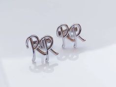 "This Custom Silver Cufflink is made of 925 sterling silver and designed for you We can write any name you want in this Letter Cufflink This Initial Cufflink will be handmade for your size at my atelier, personalized with your choice of Letter. * All jewelry is 925K Sterling Silver. We use Sterling silver 925 because it is safe and durable. * If you want to 14K gold version please contact us on a message for price. * This Necklace will be Personalized Initial Cufflink with your preffered Initial Silver Initials Cufflinks For Business, Luxury Silver Cufflinks For Father's Day, Silver Initials Cufflinks For Formal Wear, Classic Silver Cufflinks With Initials, Silver Cufflinks With Initials As A Gift, Personalized Silver Luxury Cufflinks, Silver Luxury Personalized Cufflinks, Personalized Luxury Silver Cufflinks, Luxury Personalized Silver Cufflinks