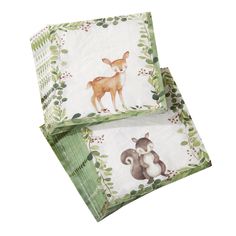 two deer napkins on top of each other with the measurements for each individual item