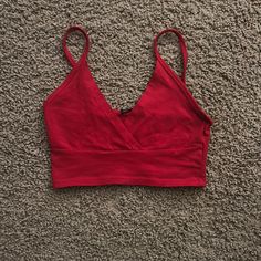 Brandy Red Tank Never Worn Soft Material Doesnt Sell Anymore Red Cotton V-neck Crop Top, Trendy Red V-neck Tank Top, Trendy Red V-neck Crop Top, Red V-neck Cotton Crop Top, Red Fitted V-neck Crop Top, Red V-neck Crop Top For Spring, Spring Red V-neck Crop Top, Red Tank, Brandy Melville Tops