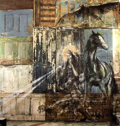 an image of a horse painted on the side of a wooden wall with peeling paint