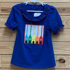 Blue Cute Crayon Applique Design Ruffles Nwot Blue Cotton T-shirt With Ruffles, Playful Fitted Blue Tops, Blue Fun Top For Play, Playful Fitted Blue T-shirt, Casual Ruffled Tops For School, Playful Blue Tops For Playtime, Fun Blue Tops For School, Multicolor Ruffled Tops For Playwear, Fitted Blue Fun T-shirt