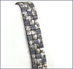 a watch bracelet is shown on a white background