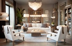 a living room filled with furniture and a chandelier