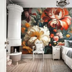 a bedroom with a large floral painting on the wall next to a white chair and bed