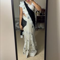 Black And White Shimmer Net Saree With Emboridery. Brand New. Never Worn. Size:36” Heavy Work Saree, Crop Top Saree, Baby Pink Saree, Crepe Silk Sarees, Orange Saree, Organza Silk Saree, Chanderi Silk Saree, Party Sarees, Heavy Work