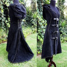 a black dress with metal studs on it