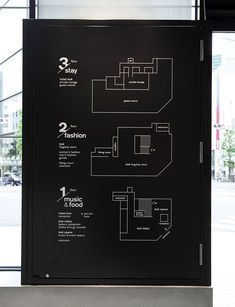 a black and white sign with instructions on how to use the elevator in an office building