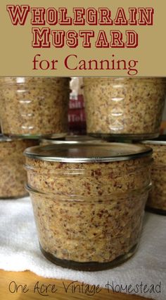 several jars filled with food sitting on top of a table