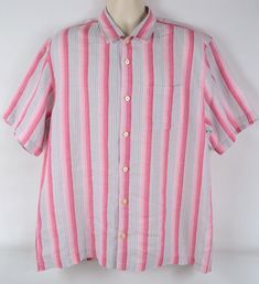 Tommy Bahama Linen Button Down Shirt (Men's, L) Condition: Excellent, Like New with no visible wear or imperfections to note. From smoke-free environment. Details:    Gray, pink and white striped button shirt, short sleeves. 100% Linen. We recommend you compare our measurements to your best fitting shirt to ensure the proper fit.  Measurements: Length: 31" Shoulder to shoulder: 20" Underarm to underarm: 24" (Chest: 48") Waist/bottom width: 24" Sleeve length: 10.5" *Please feel free to contact us Pink Relaxed Fit Collared Shirt, Pink Cotton Button-up Short Sleeve Shirt, Casual Pink Shirt With Button Closure, Pink Casual Shirt With Button Closure, Pink Relaxed Fit Button-up Shirt, Pink Relaxed Fit Collared Short Sleeve Shirt, Pink Collared Short Sleeve Shirt With Relaxed Fit, Pink Relaxed Fit Collared Camp Shirt, Pink Collared Camp Shirt For Casual Wear